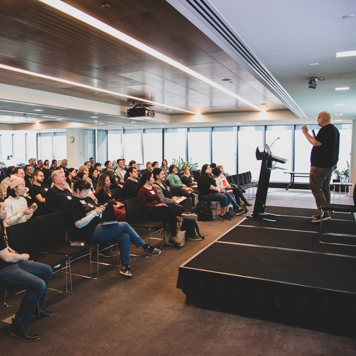 2019 Product Camp Melbourne - Crowd in main room listening to one of the speakers, Ben Jackson